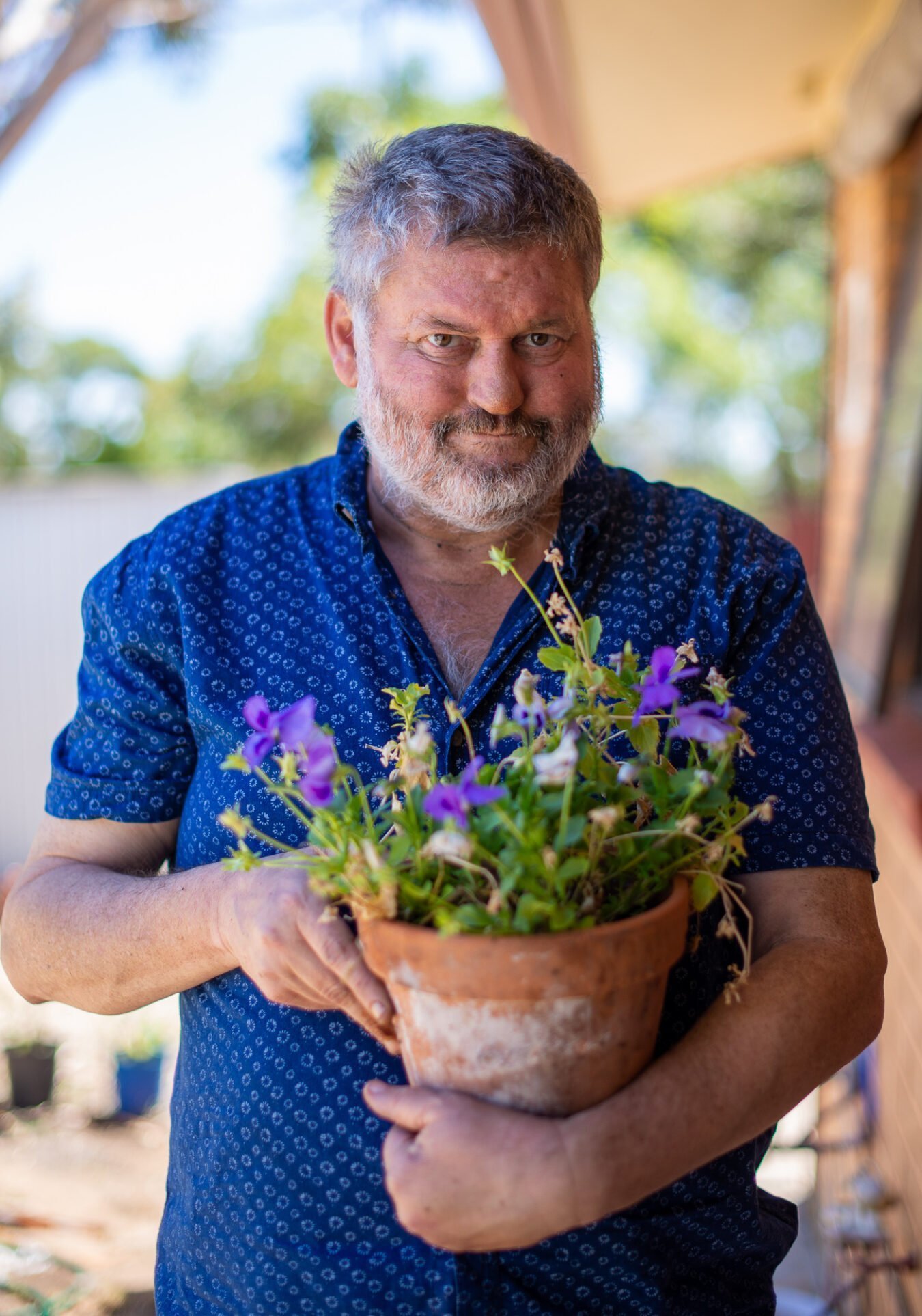 MyLifeMyWay - man holding flowers